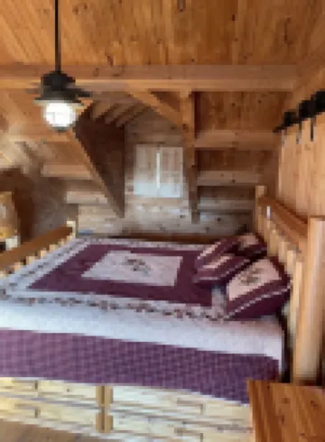 Real Log Cabin with Seasonal Pool and Hot Tub near Blue Springs Ranch