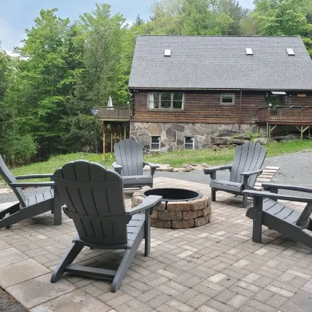 Secluded modern log cabin with picturesque private water fall on 12 acres!