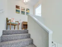 Poolside Oasis with Cozy Fireplace - Charming Coastal Retreat