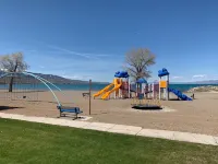 BREATHTAKING LAKE VIEW WITH PRIVATE BEACH ACCESS!  NEXT TO GOLF COURSE!