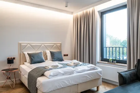 RentPlanet - Apartamenty Jagiełły Отели рядом с достопримечательностью «Archive Wroclaw University of Technology»