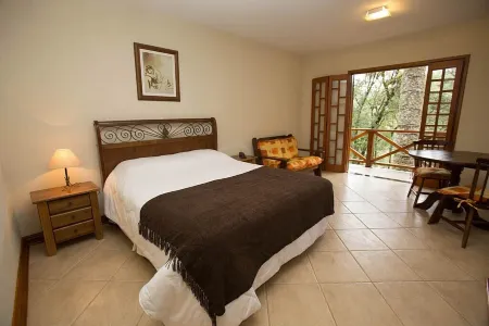 Pousada Chalé da Floresta Отели в г. Монти-Верди