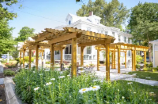 Charming Inn with Outdoor Trellis and Cozy Porch - Inviting Escape