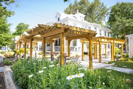 Charming Inn with Outdoor Trellis and Cozy Porch - Inviting Escape