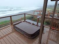 Private Deck and Hot Tub Escape - Charming Oceanfront Getaway