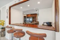 Rooftop Terrace and Heated Pool Amenities - Elegant Coastal Haven