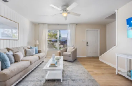 Private Balcony and Tropical Patio Retreat - Stylish Coastal Haven