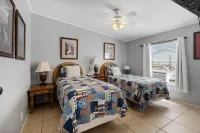 Canal Front Access and Outdoor Patio - Charming Beachside Retreat