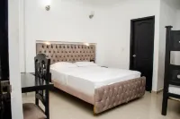 Ayenda Hotel Muleke - Hostels