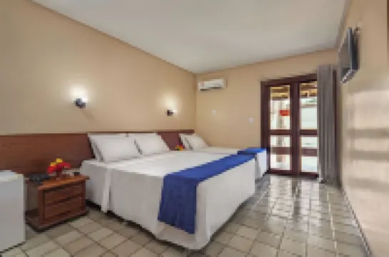 Rede Andrade Estrela Dalva Centro Hotel Отели в г. 