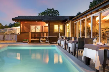 Glamping Villaggio Parco Dei Castagni 4 Stelle Отели в г. Павулло-нель-Фриньяно