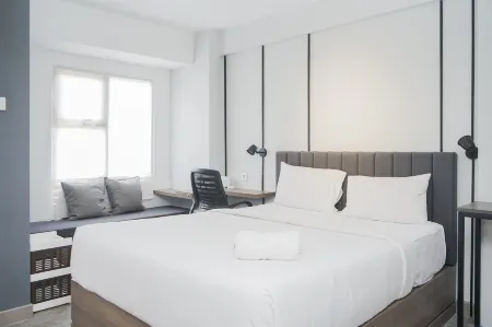 Warm and Simply Studio Room at Urbantown Serpong Apartment