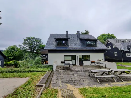 Spacious Semi Detached House with Wood Stove Located Directly on the Rennsteig Hotels in Sachsenbrunn