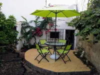 2-storey house with small garden and balcony