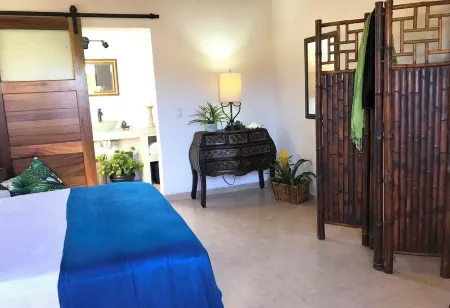 Chic room in plant filled boutique hotel near beach and plaza in Lo de Marcos
