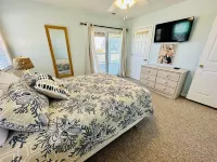 Beachfront 5-bedroom vacation home steps to the beach with hot tub!