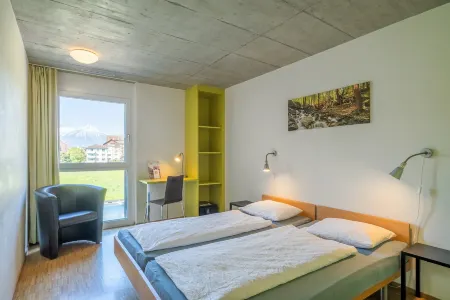 Backpackers Villa Sonnenhof - Hostel Interlaken Отели в г. Гштейгвилер