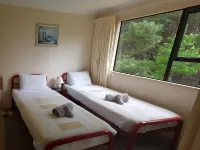 Secluded Cottage on beautiful private Peninsula Hotels near Mangarakau Wetland Field Centre