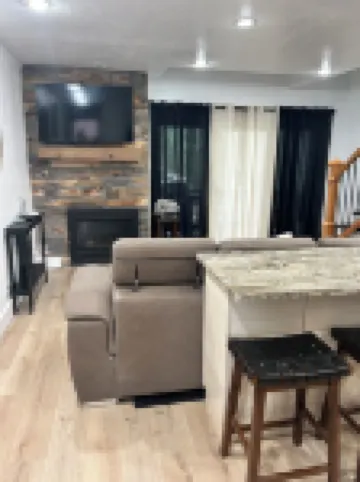 A Cozy Mountain Retreatwith boat parking fun for the whole family.