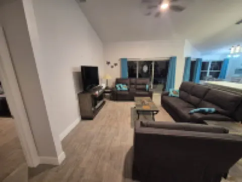 Sadie's Daytona private pool home with 5 king beds , pool table and arcade games