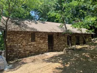 Historic "Woody" Cabin on the River at Miramichee Falls with Kayaks