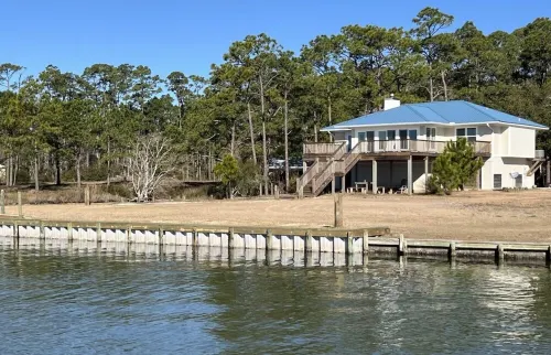 3 bdrm home with private dock located on Lagoon close to beach and downtown