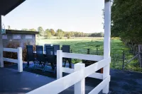 Comfortably Furnished Chalet with Porch Near Veluwe