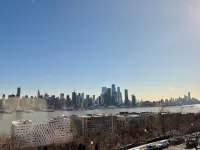 Waterfront NYC skyline views spacious 4 bedroom Hotels in Weehawken