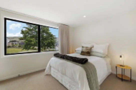 Warm and stylish new home close to river, lake, restaurants and golf course.