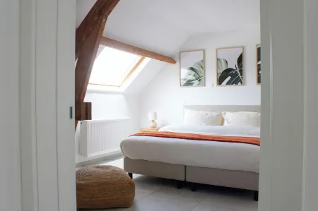 Stijlvolle Boho Chic Escape in Mechelen aan Station Отели в г. Мехелен