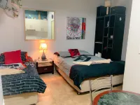 Westside Studio Apartments Hotels near Wright Village, University of New England