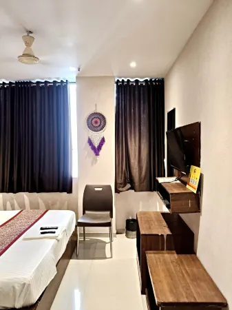 Hotel Sunrise Cave Отели в г. Сурат