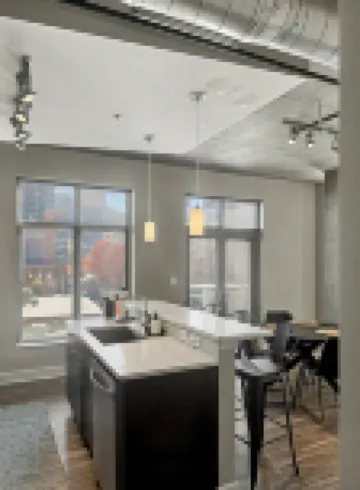 Loft-Style King Suite • City Views + Huge Windows