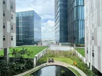 Wooden Accents 1BR at Podomoro City Deli Medan Apartment By Travelio