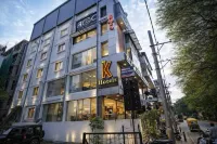 K Hotels by Syn フロンティア・マネジメント・センター周辺のホテル