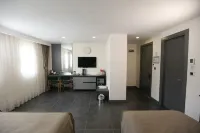 Ren Business Hotel - Homestays