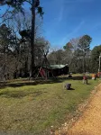 Quiet cabin in the woods w/ access to pools, river, & lakes in gated community!!