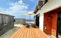 Amami Oshima a Mansion with a Coral Island and a فنادق في أمامي
