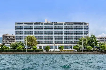 Makedonia Palace Отели рядом с достопримечательностью «Влатадон»
