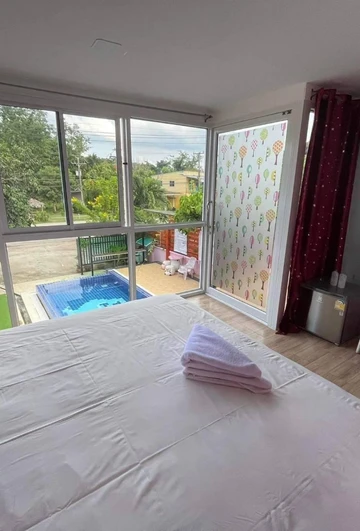 รูปภาพของบ้านกรชมพู