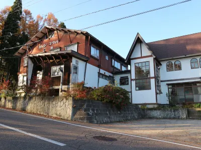 Lodge Kokuha Отели в г. 
