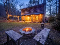 Steps to Elk River! Cozy Cabin w/ Hot Tub & Bunk Room Hotels in Avery County