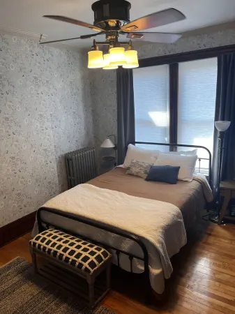 Romantic Second floor walk up Studio suite in central Marquette w sauna access