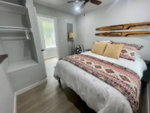 SHORT WALK TO WATER & NESTLED IN THE TREES THIS BEAUTIFUL CABIN HAS LAKE VIEWS