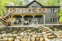 Beautiful new modern cabin with 100 feet of shoreline on Long Lake