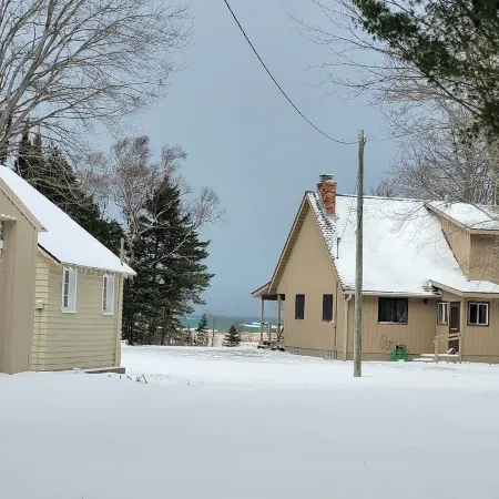 Waterfront house w/ large garage located on trail 8 in Grand Marais.