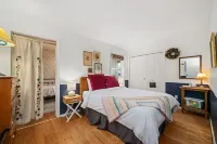 Relax and unwind in a tranquil space one block from the beach