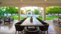 Spacious Palm-Lined Villa with Pool, Sport Court & Outdoor Living