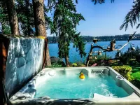 This Whidbey Island  waterfront vacation home is your own private resort.