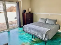 Riverfront Studio Cabin w/ Sunset View, Wi-Fi, Yard, and Fire-pit!